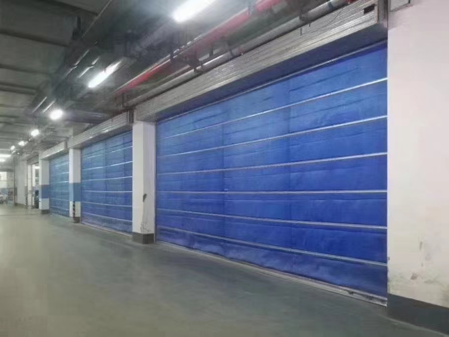 Inorganic fabric fire retardant rolling shutter door